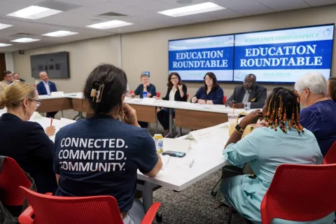Picture of shirt that says connected committed community