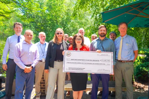 Elfreth presents funding to the Maryland Department of Natural Resources