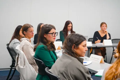 Picture of Elfreth listening at roundtable